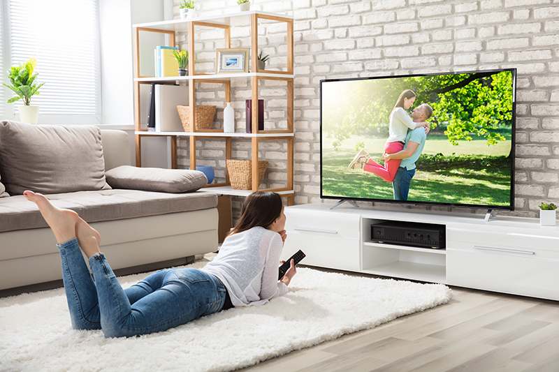 Girl watching led tv